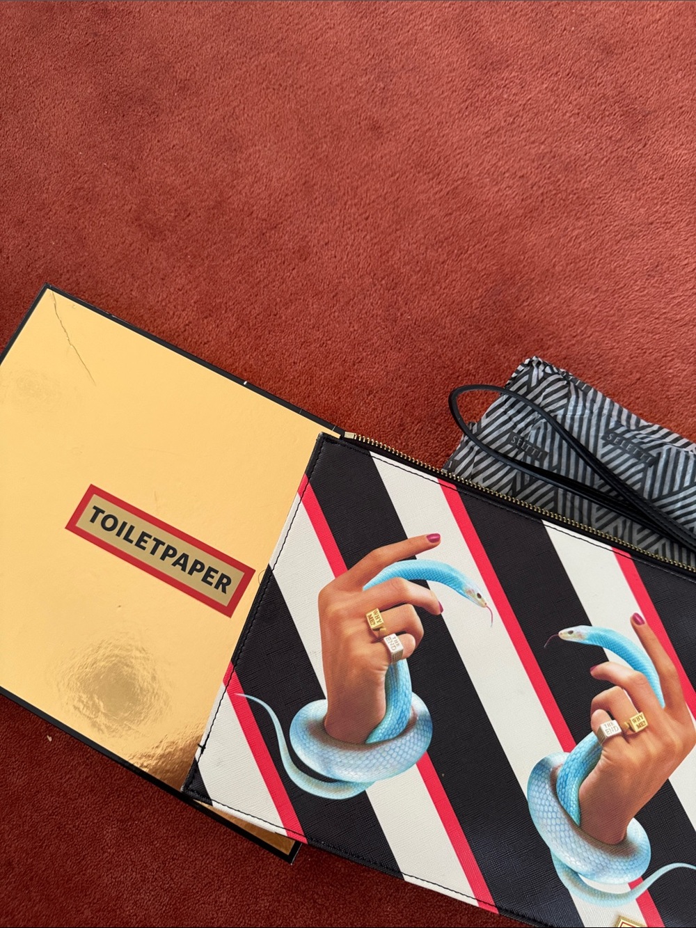 Seletti Black & White Stripe Clutch with Blue Snake Motif